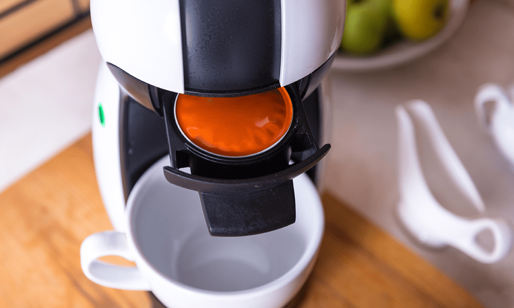Compostable coffee capsules made from INZEA's sustainable biopolymers.