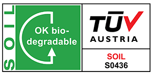 Sello TÜV Austria OK biodegradable SOIL que certifica la biodegradación directa en el suelo de los biopolímeros INZEA según la norma EN 17033.